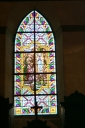 Verrière à personnages de la baie 9 : Apparition de la Vierge à sainte Bernadette
