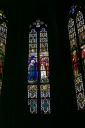 Ensemble des 7 verrières à personnages des baies 100 à 106 : couronnement de la Vierge, saint Louis, saint Jean, saint Pierre, sainte Marguerite, saint Laurent, saint Thomas d'Aquin (?), saint Paul, saint évêque