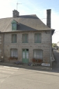 Les maisons à boutique du village de Coglès (fusionnée en Les Portes du Coglais en 2017)