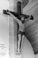 Croix : Christ en croix, église paroissiale Saint Corentin (Glomel)
