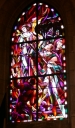 8 verrières, baies 5 à 14 : Saint Yves, Présentation de l'Enfant au temple, saint Roch, saint Esprit, Christ, Jeanne d'Arc, saint Evêque, Dieu le Père
