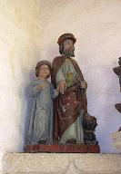 Groupe sculpté (petite nature, d'applique) : saint Hervé dit saint Hervé, son guide Guiharan et le loup, chapelle Saint-Houarno ou Saint-Hervé (Langoëlan)