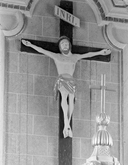 Croix : Christ en croix (1), église paroissiale Saint-Primel (Primelin)