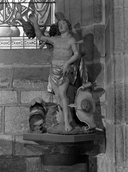 Statue, groupe sculpté (en pendant) : saint Sébastien, l'ange Gardien, église paroissiale Notre-Dame-de-Roscudon (Pont-Croix)